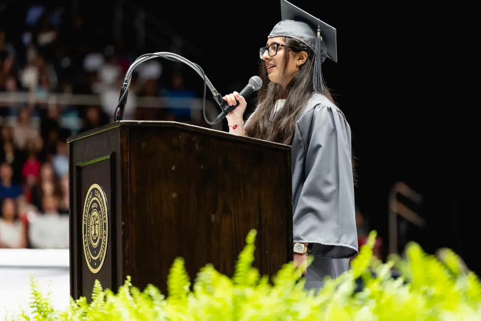 Khushia Bhatia speaking at Central Piedmont's spring 2026 commencement