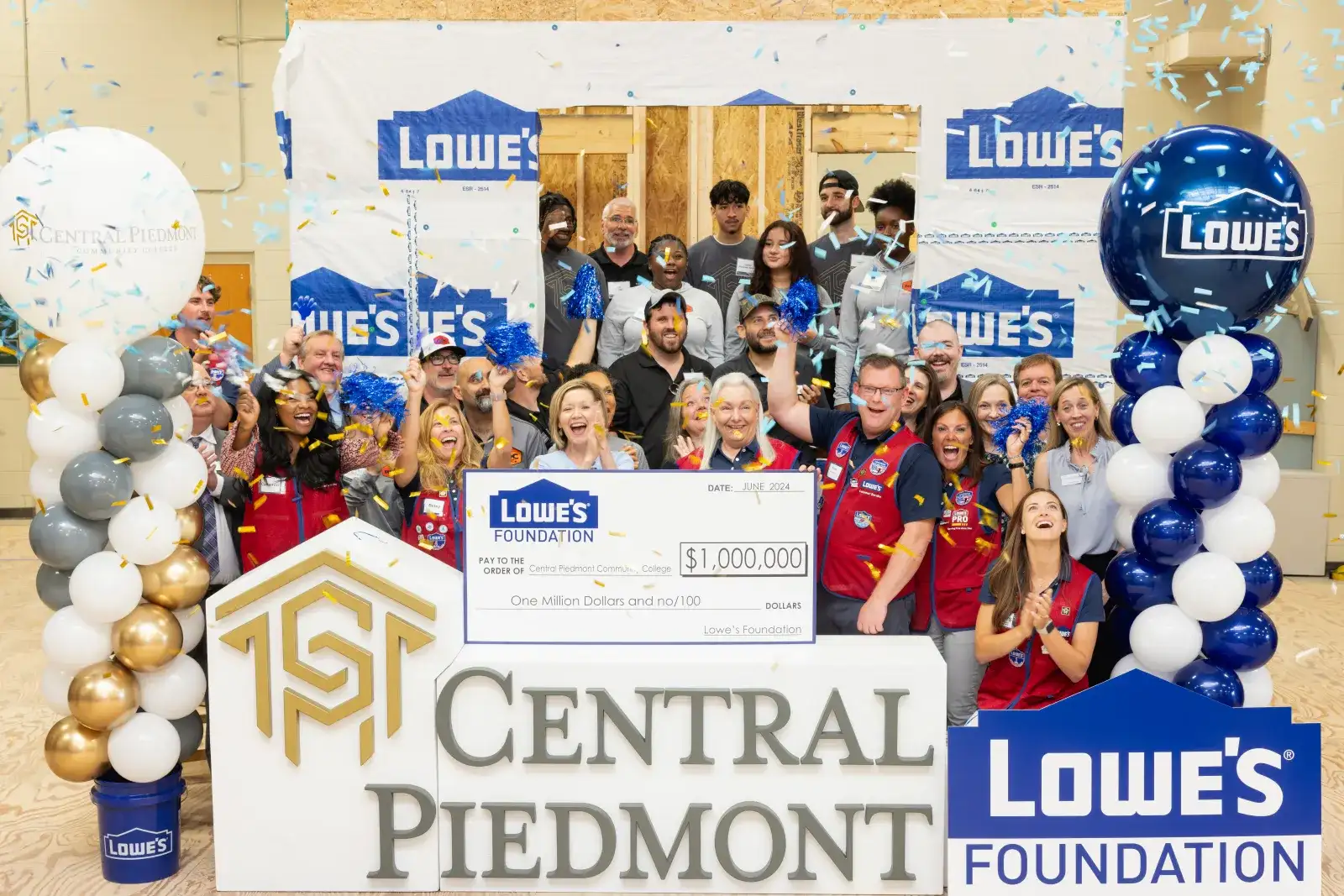 Central Piedmont and Lowe's staff with a one million dollar cheque presentation