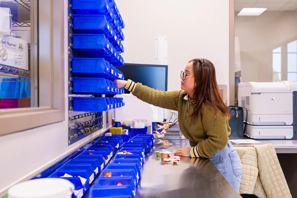 Pharmacy Technology student practicing refills