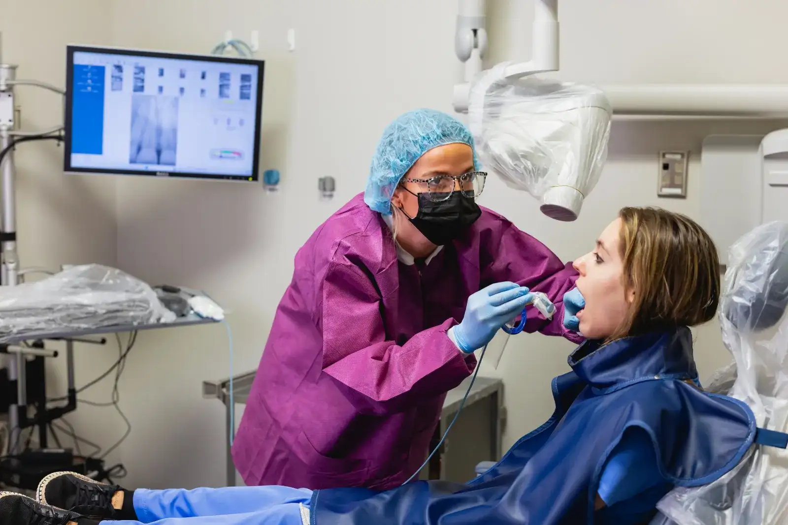 Central Piedmont dental students working together in the lab