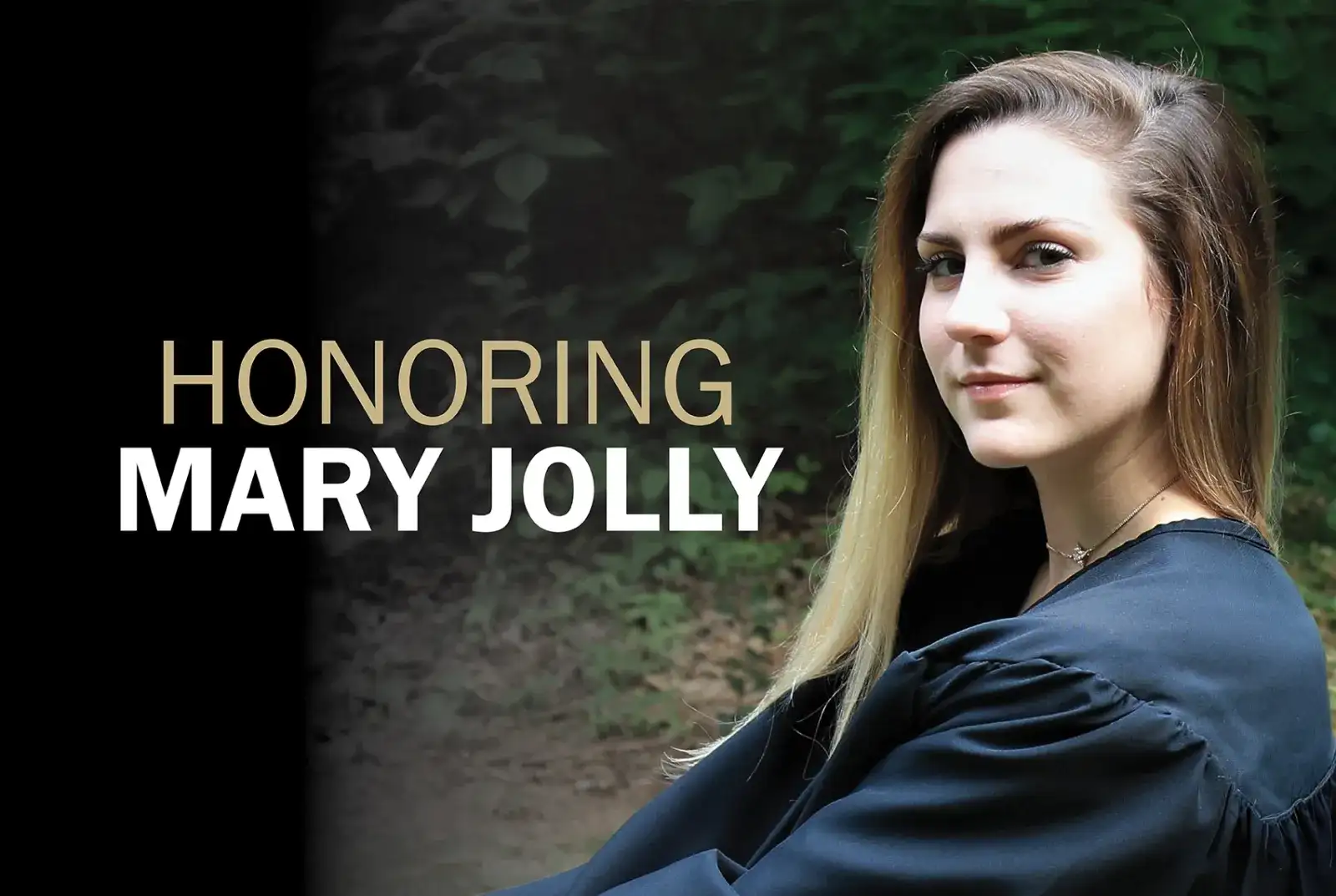 Mary Jolly sitting and looking at camera