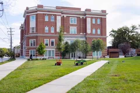 Outdoor image of the front of the Levine Health Sciences Center on Central campus