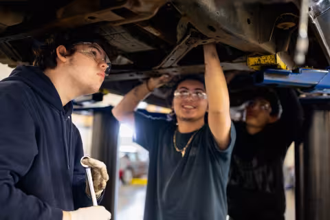 Students in the automotive systems technology program working on a car at Central Piedmont