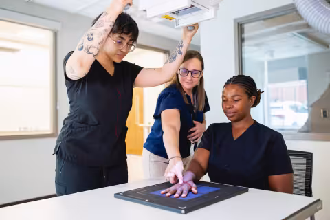 Students practicing the use of Radiography equipment